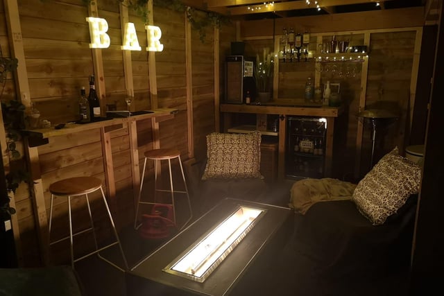 Ed Arthur has been busy turning his disused car port into a cosy outdoor space for a bar.