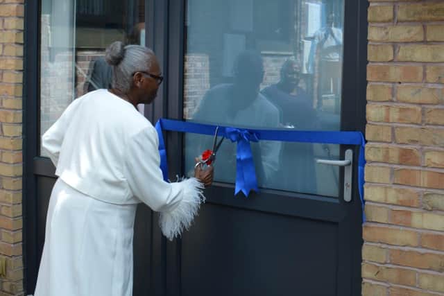 Performing the official ribbon-cutting ceremony