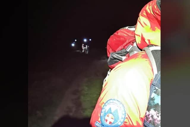 Rescuers at the scene in the Peak District last night