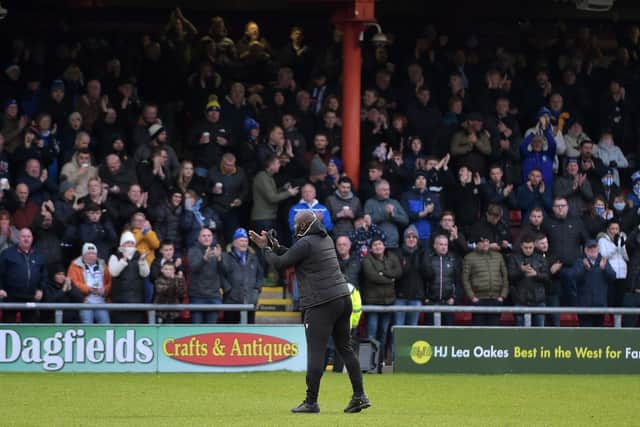 Darren Moore applauds the Sheffield Wednesday supporters - they're going to be key in the final run-in.