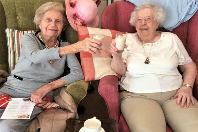 Four Seasons-Residents Nora Gilliver and Joyce Paine trying the peanut butter & banana smoothie.
