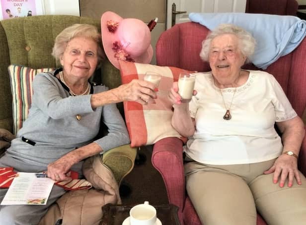 Four Seasons-Residents Nora Gilliver and Joyce Paine trying the peanut butter & banana smoothie.