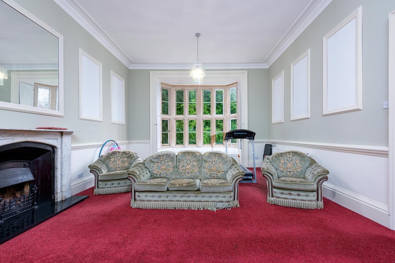 There are five reception rooms throughout the property, including this generously sized drawing room which could easily be converted into an additional bedroom.