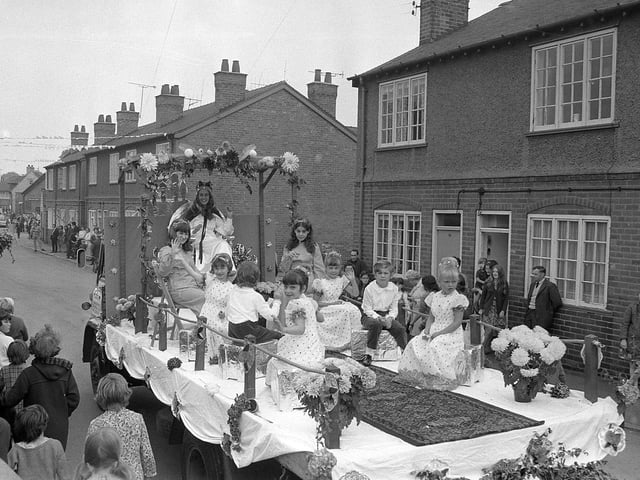Residents line the streets every year to watch the parade.