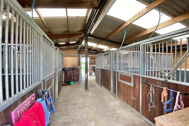 Here is the interior of the stable block. With additional tack and storage, it is a dream for horse lovers.