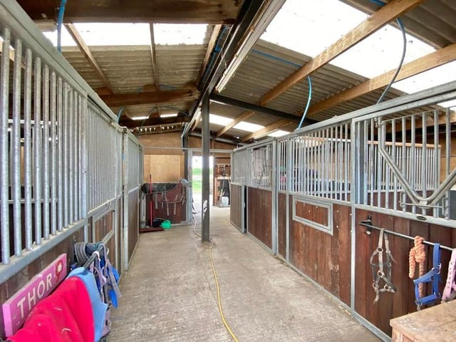 Here is the interior of the stable block. With additional tack and storage, it is a dream for horse lovers.