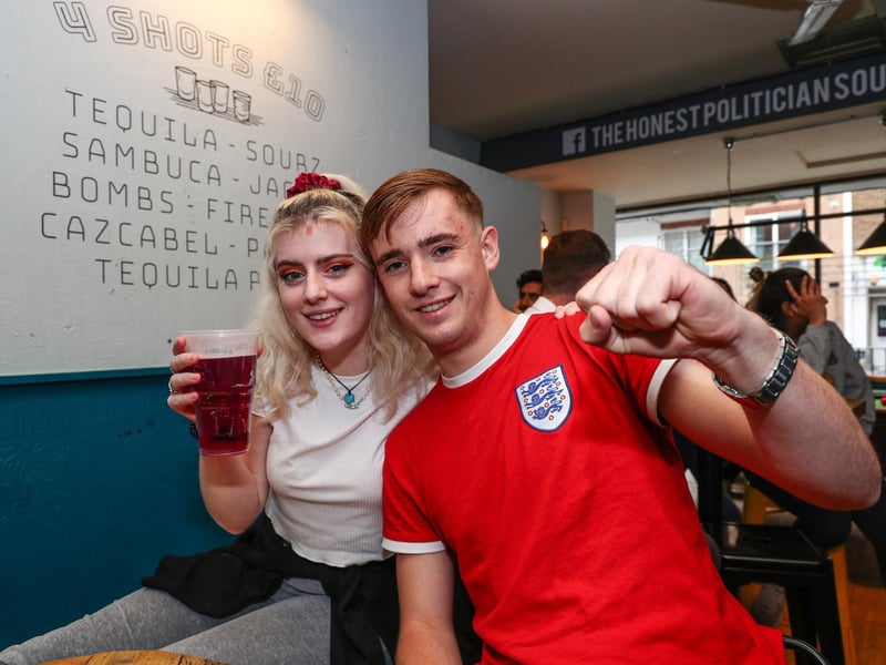 England fans watch England beat Germany 2-0 in the Euros 2020. Fans pictured in the Honest Politician pub. Luke Stallard and Louren O'Neill. Picture: Stuart Martin (220421-7042)