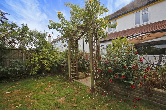 The property enjoys mature gardens to both the front and rear