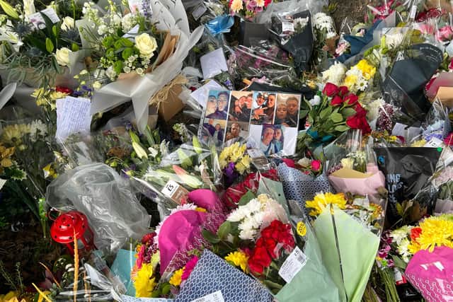 Floral tributes, photographs, hand written notes and balloons have been left at the scene of the crash in Kiveton Park, Rotherham.