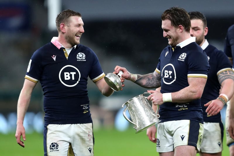 Scotland's Finn Russell and Stuart Hogg (right) with the Calcutta Cup after the Guinness Six Nations match at Twickenham Stadium