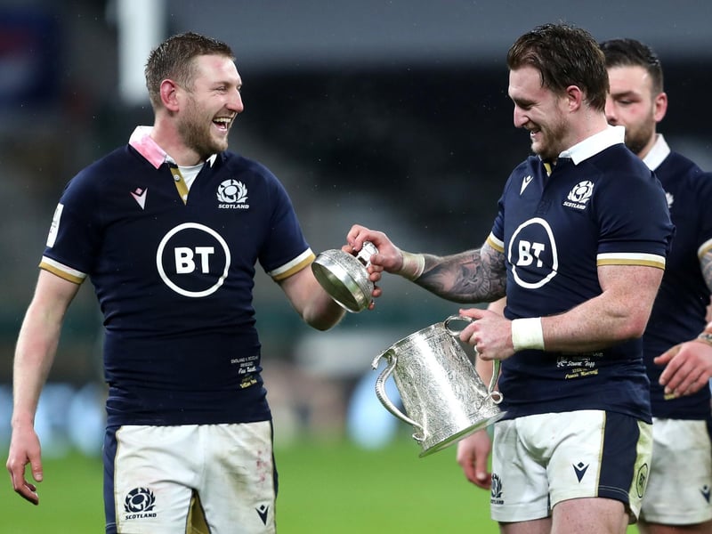 Scotland's Finn Russell and Stuart Hogg (right) with the Calcutta Cup after the Guinness Six Nations match at Twickenham Stadium