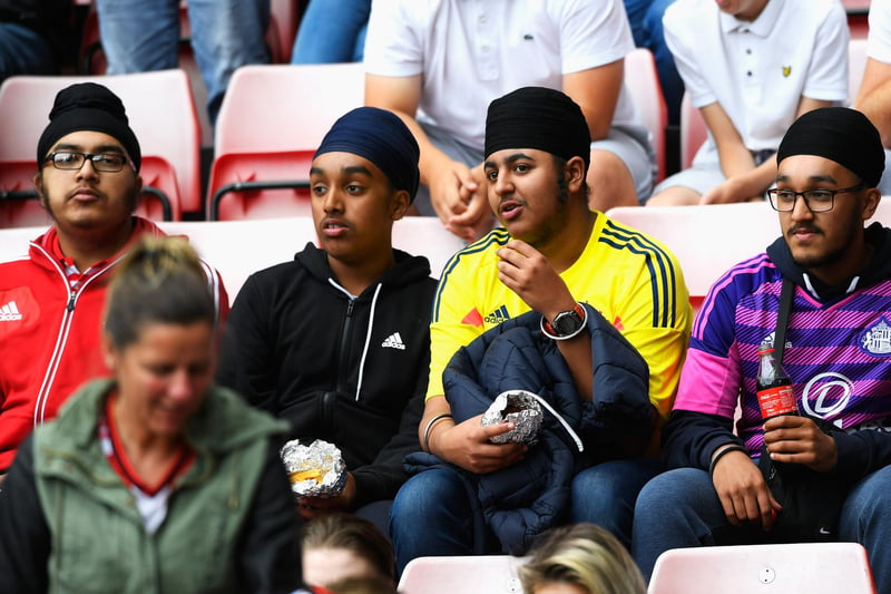 Sunderland fans watch the action during the Premier League match between Sunderland and Middlesbrough at Stadium of Light.