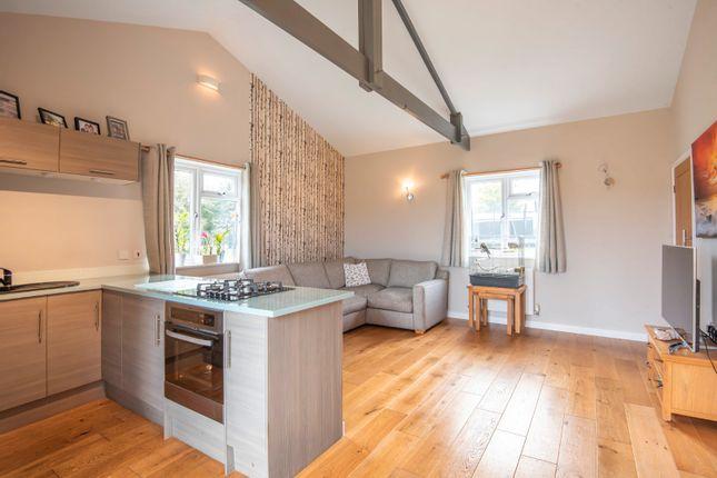 The property also boasts a detached annexe, which features an entrance hall, bedroom, bathroom, and an open plan kitchen, dining and living area
