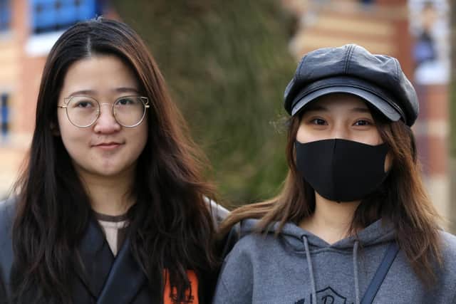 Coronavirus fears in Sheffield. Pictured are Xinyu Hu and Carina Xu.