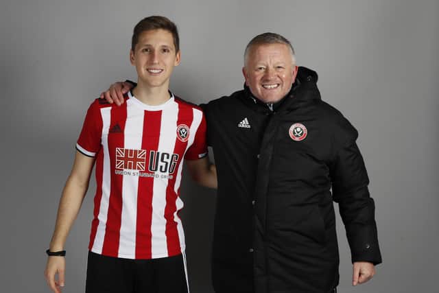 Panagiotis Retsos is welcomed by Sheffield United manager Chris Wilder following the announcement of his signing at the Steelphalt Academy, Sheffield: Simon Bellis/Sportimage
