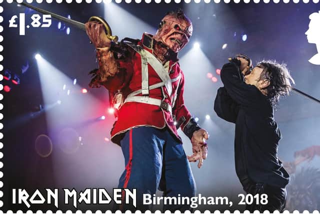 Bruce Dickinson ‘sword fighting’ with Eddie in Birmingham, August 2018, on a £1.85  stamp