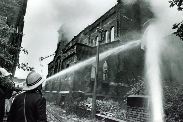 Firemen on the scene of a fire at the Zion Chapel, Attercliffe, Sheffield, on June 22 1987