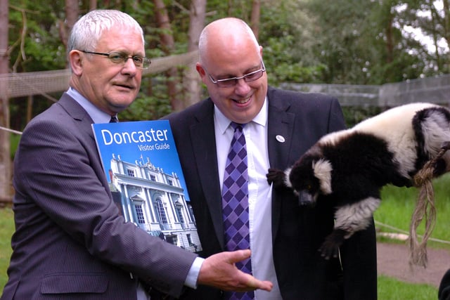 Doncaster's elected Mayor Peter Davies (left) and Chris Dungworth launched the new Doncaster Visitor Guide at the Yorkshire Wildlife Park and were joined by one of the park's inhabitants, a Lemur.