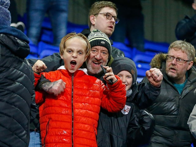 Mansfield fans watch the 3-2 defeat at Tranmere Rovers.