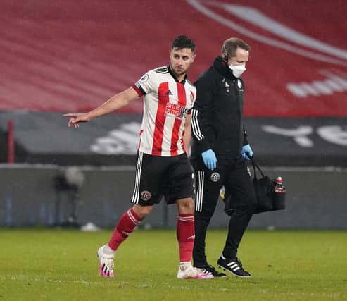 George Baldock is a major doubt for Sheffield United's game against Chelsea this weekend: Andrew Yates/Sportimage