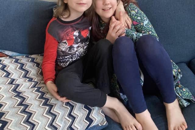 Sam and his nine-year-old sister Cara.