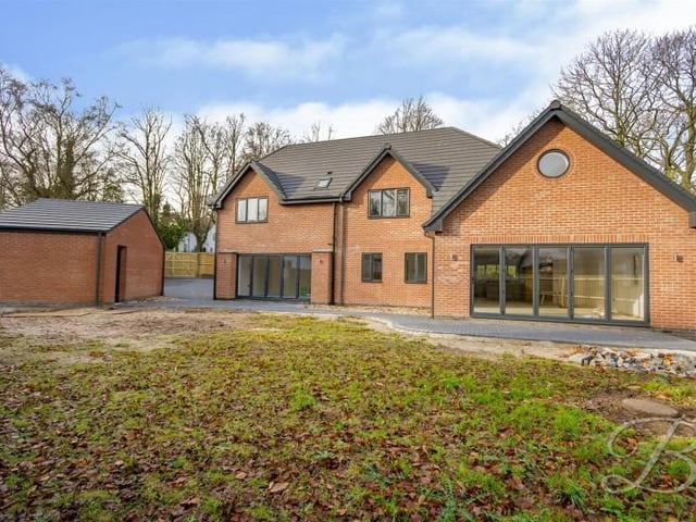 To the rear of the property there is a brick patio area and the rest laid to lawn.