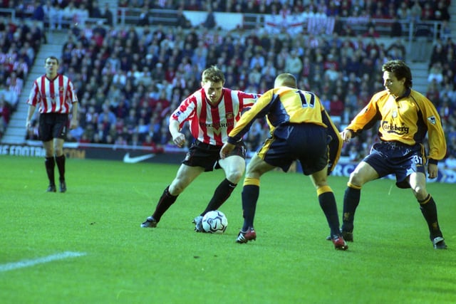 Kevin Kilbane in action for Sunderland against Liverpool in this Stadium of Light scene in April 2002.