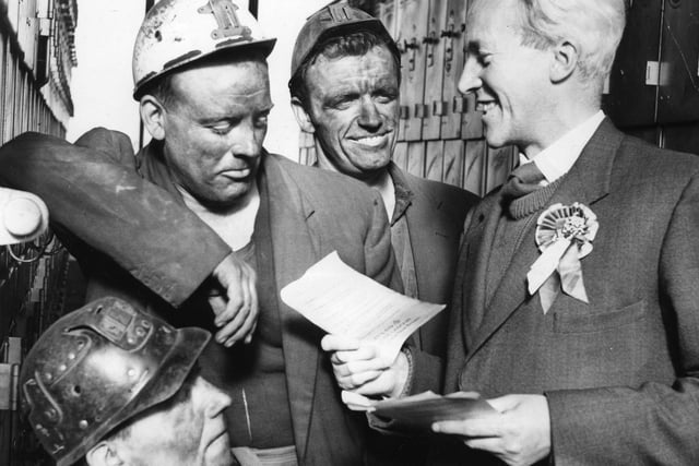Arthur Blenkinsop, Labour candidate for South Shields, talking to miners George Falconer, Bill Bissett, Ronnie Moffatt, during a visit to Westoe Colliery in October 1964.
