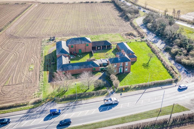 This farmhouse, plus barns, stands in grounds of an acre and has a guide price of £700,000. The sale is being handled by Fine & Country at Bawtry. (https://www.zoopla.co.uk/for-sale/details/54597568)
