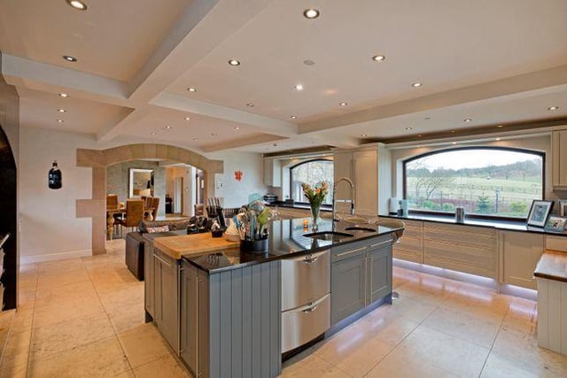 The kitchen is large and stylish, and ideal for living family use