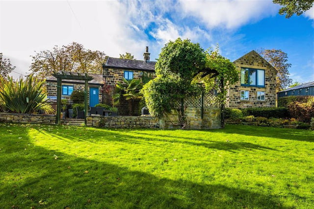 Hawthorne Barn, on Stockarth Lane, Worrall, has a neat lawned garden with a patio and countryside views. Offers in the region of £540,000 are being invited and the sale is being handled by Spencer. (https://www.zoopla.co.uk/for-sale/details/54993850)