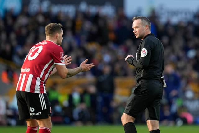Billy Sharp of Sheffield United complains to referee Paul Tierney after his goal at Wolves was ruled out: Andrew Yates / Sportimage