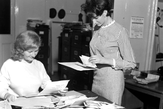 Staff reading a batch of letters in response to the Evening News' 'Meet the Baby' photograph feature at North Bridge in June 1966.