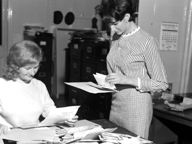 Staff reading a batch of letters in response to the Evening News' 'Meet the Baby' photograph feature at North Bridge in June 1966.