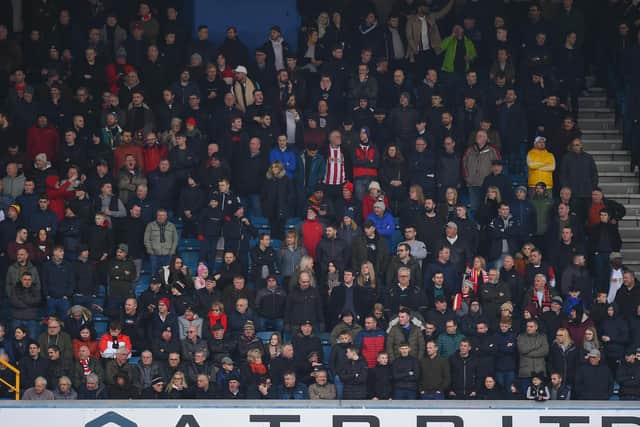 Sheffield United fans during the FA Cup match against Millwall at The Den, London. Robin Parker/Sportimage