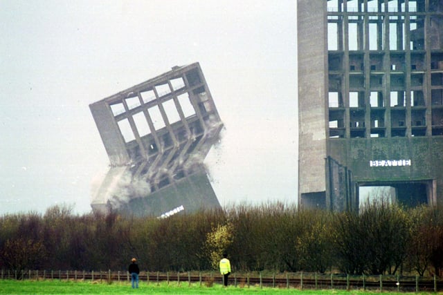 The winding towers at Rothes colliery at Thronton, Fife, being demolished in March 1993.