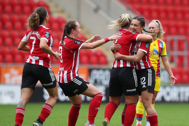 Rhema Lord-Mears (r) celebrates scoring the first goal during the The FA Women's Championship match at the New York Stadium, Rotherham: Simon Bellis / Sportimage