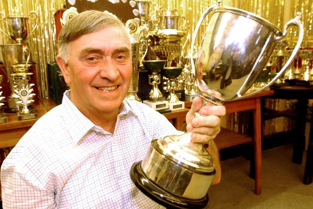 Albert Grayhurst in 2003 who had been playing in the Hillsborough & District Games League for 50 years and was presented with a special award at the league's 50th anniversary presentation night at the La Plata Social Club, Hillsborough by the leagues secretary John Pennington