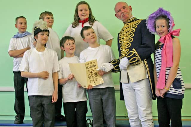 Children from St Thomas More Primary School in Grenoside with Ian Stewart, who plays First Lord of the Admiralty Sir Joseph Porter in Dore Gilbert and Sullivan Society’s forthcoming production of nautical comedy classic HMS Pinafore, March 4, 2011