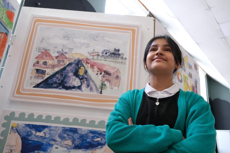 Nether Edge Primary School held its annual art exhibition. Umaima with her painting