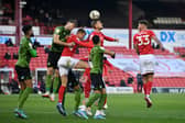 Michal Helik rises for a high ball in Barnsley's match against AFC  Bournemouth. Photo: Bruce Rollinson.