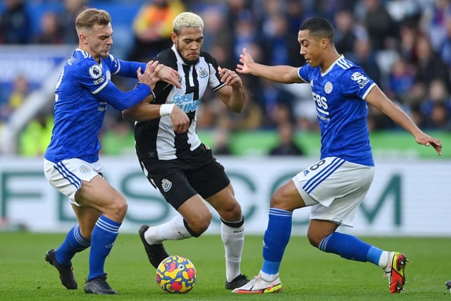 Joelinton of Newcastle United battles for possession with Kiernan Dewsbury-Hall and Youri Tielemans of Leicester City during the Premier League match between Leicester City and Newcastle United at The King Power Stadium on December 12, 2021 in Leicester, England. (Photo by Gareth Copley/Getty Images)