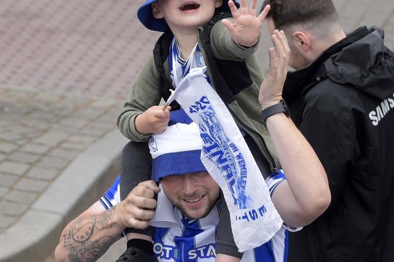 A young Owls fan out to celebrate the promotion.