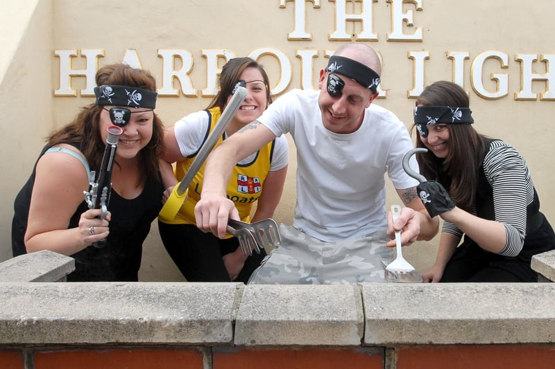 A 2009 scene which shows a pirate-themed barbecue at Harbour Lights as part of Ruth Hedley's fundraising for the Great North Run. Pictured left to right are Karen Ratcliffe, Ruth Hedley, Philip Monck and Clare Selby.