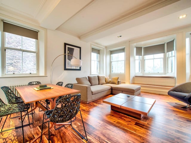 This incredible flat comes fully furnished, with some of the best views of Edinburgh, looking out across the New Town and to the Firth of Forth and Fife.