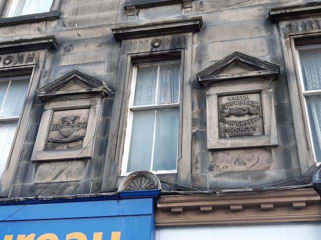 This stone relief on premises formerly belonging to the Leith Provident Co-operative Society can be seen today on Dalmeny Street. The Leith Provident was founded in 1878 and had its own Edinburgh merger a century later, becoming part of the Capital's St Cuthbert's Co-op, which was one of the largest in the UK's co-operative industry.
