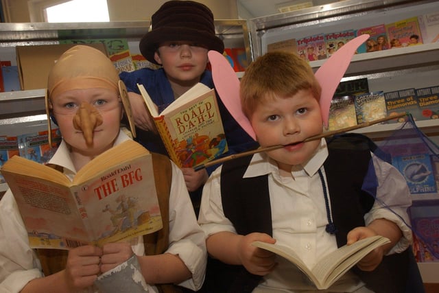 Pupils at St Catherine's School Pitsmoor, Sheffield Elliot, Reuben and Jake all dressed up as their favourite characters for World Book Day in March 2004