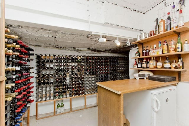 Wine lovers will be pleased to discover an impressive wine cellar in the basement of the home.
