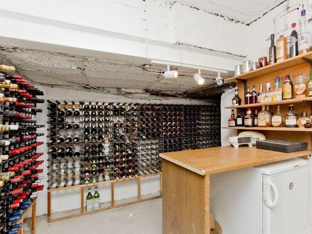 Wine lovers will be pleased to discover an impressive wine cellar in the basement of the home.