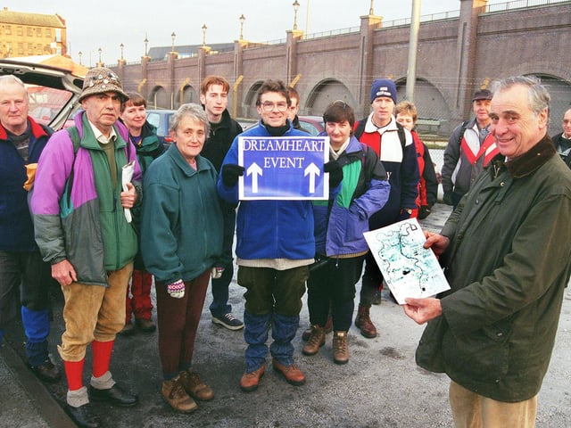 Walkers on the Dreamheart Appeal Millennium Walk gather at the start on Marsh Gate, Doncaster. Seen right with the course map is administrator Dennis Shaw, with two of the organisers David Phillips and Margaret Turner in the centre with the event sign.